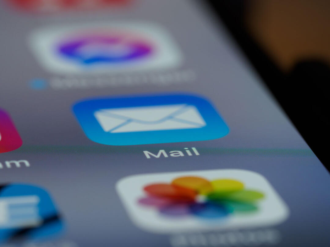 Close-up of a smartphone email app symbolizing online renovation quote requests, home renovation consultations, and transparent project pricing in Sydney.